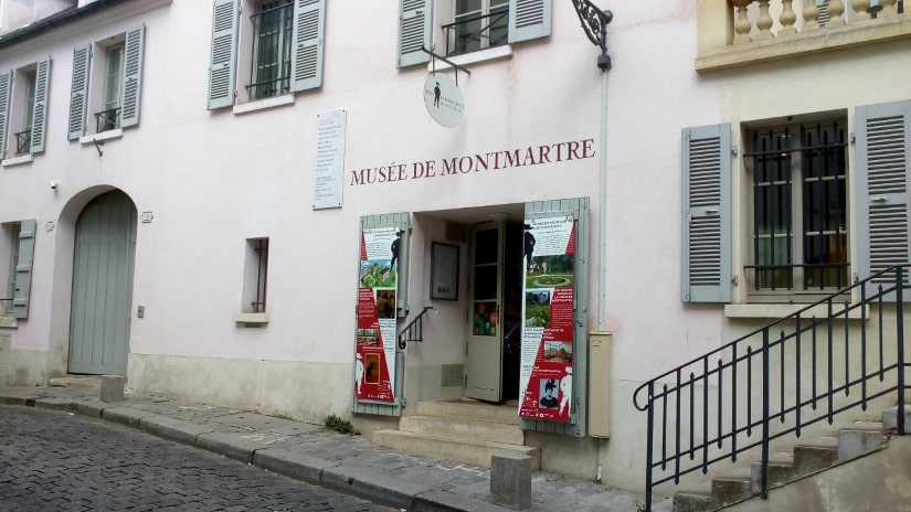 The lack of disabled access to the Montmartre Museum. Three steps lead up to entrance from the pavement. The disabled entrance to left is made difficult by a small step and no ramp.