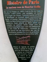 The metalic information panel put up by the Mayor of Paris outside the Maison Rose (Pink House) in Montmartre. The text is in French and is translated in the body of the page text.