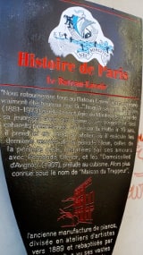 The metalic information panel put up by the Mayor of Paris outside the Bateau Lavoir artists studios in Montmartre. The text is in French and is translated in the body of the page text.