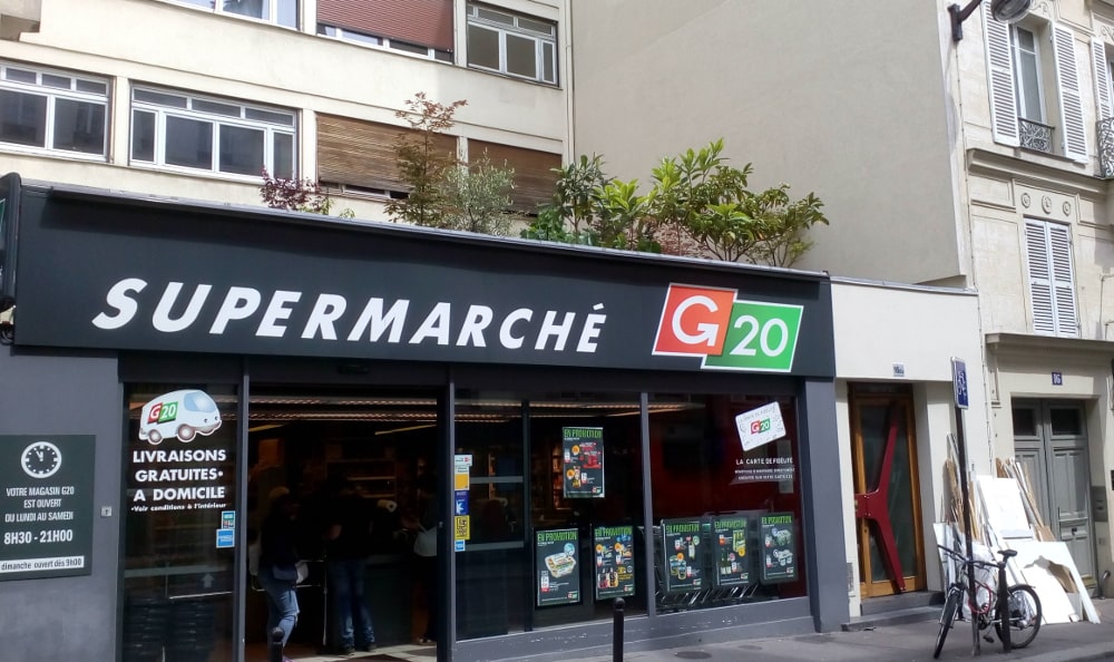 A view of a one storey supermarket facade at 16 Bis Rue Pierre Fontaine Montmartre. The pavement and some apartments are also visible. This is the site of Joe Zelli’s jazz club one of the most in vogue jazz clubs of Paris in the 1920s. Nothing of Zelli’s club remains.